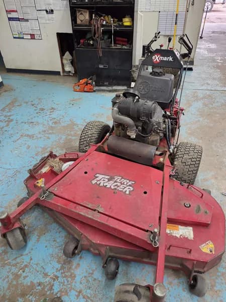 Exmark Turf Tracer Walk-Behind Mower with ECS Controls, side view