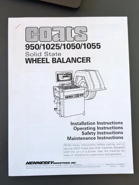 Coats 1050 Solid State Direct Drive Computer Wheel Balancer w/ Weights, close-up view